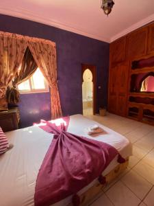 Riad Tichka piscine palmeraie