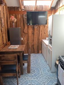 Departamento frente a la entrada de los ojos del caburgua