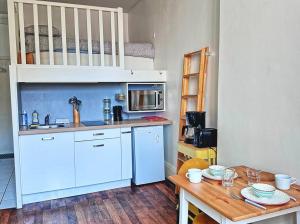 Studio central et confortable