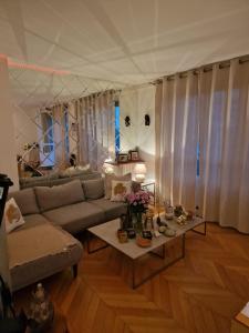 Appartements magnifique appartement proche du centre : photos des chambres