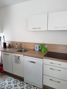 Duplex, 2 chambres, 75m2 proche Commerces et plage