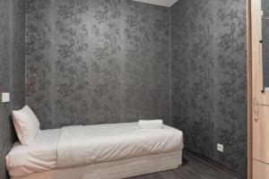 Good and Homey 2BR at Nifarro Park Apartment By Travelio