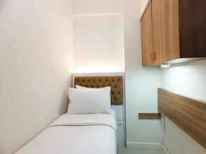 Comfort 2BR at 28th Floor Vida View Makassar Apartment By Travelio