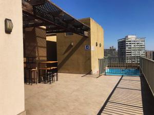 Bello y acogedor dpto cerca metro Baquedano 1303