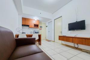 Wonderful 2BR at M-Town Residence near Summarecon Mall By Travelio