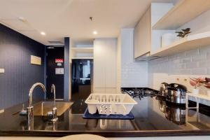 Good and Homey 1BR at Branz BSD City Apartment By Travelio