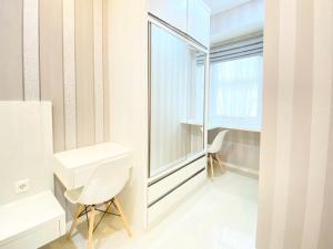 Spacious and Minimalist 2BR Apartment at Parahyangan Residence By Travelio