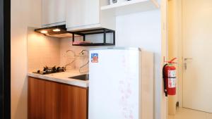 Calm Studio at Supermall Mansion Apartment Benson Tower By Travelio