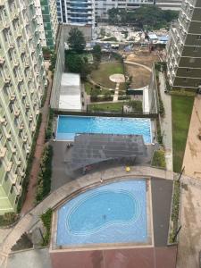 Avida Riala T3 12F with WiFi WorkDesk SmartTV and Pool