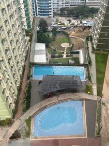 Avida Riala T3 12F with WiFi WorkDesk SmartTV and Pool