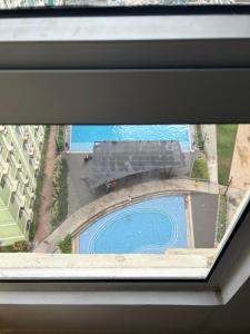 Avida Riala T3 12F with WiFi WorkDesk SmartTV and Pool