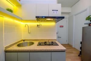Great Choice and Cozy 2BR at Green Pramuka City Apartment By Travelio