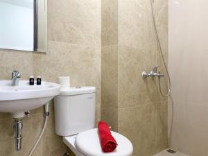 Elegant Studio at Transpark Cibubur Apartment near Shopping Mall By Travelio