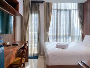 Modern and Comfort Studio Room Apartment at Capitol Park Residence By Travelio