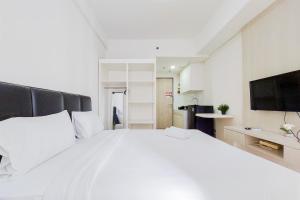 Well Furnished Studio at Akasa Pure Living BSD Apartment By Travelio