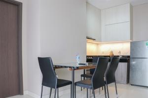 Spacious and Homey 2BR at Ciputra International Apartment By Travelio