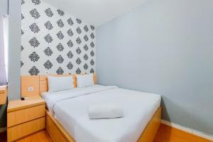 Cozy Stay Studio Apartment at Aeropolis Residence By Travelio