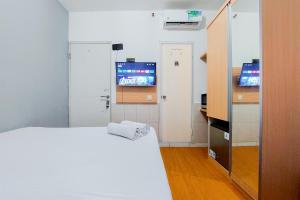 Cozy Stay Studio Apartment at Aeropolis Residence By Travelio