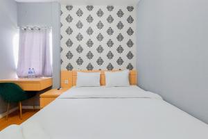 Cozy Stay Studio Apartment at Aeropolis Residence By Travelio