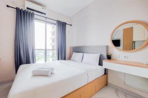 Best Homey Studio at Sky House BSD Apartment By Travelio