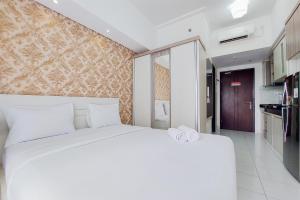 Good Deal and Cozy Studio Casa De Parco Apartment By Travelio