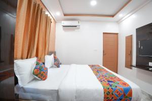 FabHotel A White Pearl Suites - Nr Bangalore Airport