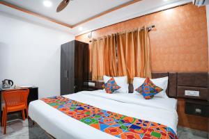 FabHotel A White Pearl Suites - Nr Bangalore Airport