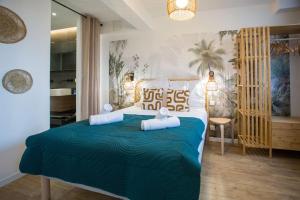 Appartements DK Lodges Netflix Wifi Proche centre ville : photos des chambres