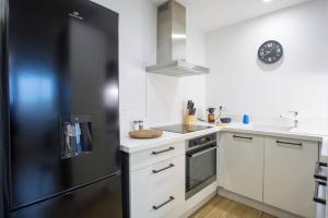 Appartements DK Lodges Netflix Wifi Proche centre ville : photos des chambres