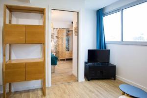 Appartements DK Lodges Netflix Wifi Proche centre ville : photos des chambres