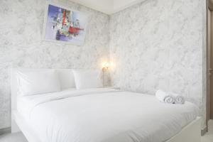 Warm and Elegant 1BR at Gold Coast Apartment By Travelio