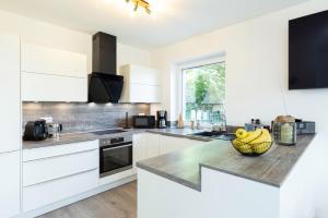 Komfort-Ferienhaus "Heimathafen" Mittelweg 43c APPARTO Grömitz