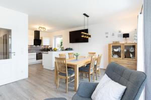 Komfort-Ferienhaus "Heimathafen" Mittelweg 43c APPARTO Grömitz