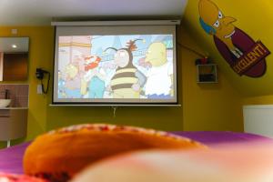 Appartements Capsule Springfield - Balneo -Sauna - Billard : photos des chambres
