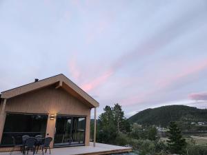 Nyoppført hytte med mulighet til å leie badestamp