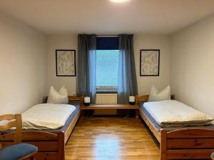 Pension FAULPELZ - Zweibettzimmer Gemeinschaftsbad