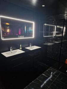 Appartements Suite Coquine avec jacuzzi YaoSpa60 : photos des chambres