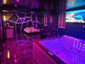 Appartements Suite Coquine avec jacuzzi YaoSpa60 : photos des chambres
