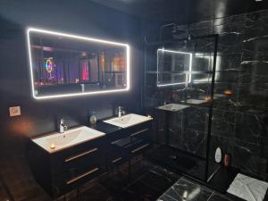 Appartements Suite Coquine avec jacuzzi YaoSpa60 : photos des chambres