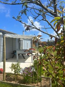 Maisons de vacances TI KAZ - Terrasse exterieure - 5mn Plage : photos des chambres