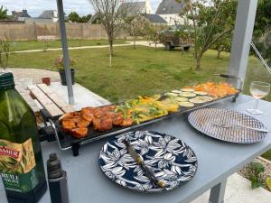 Maisons de vacances TI KAZ - Terrasse exterieure - 5mn Plage : photos des chambres