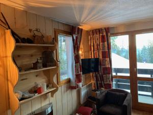 Appartements P2-3 esprit chalet sur les pistes de Courchevel : photos des chambres