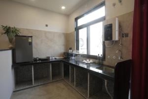 Earthen Bliss Luxury 2BHK Apt with Balcony