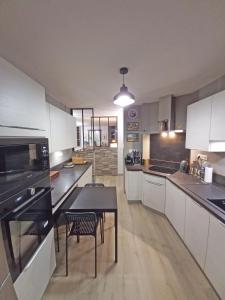 Appartements Les Carmes : photos des chambres