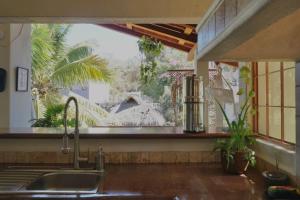 Casa Redonda Penthouse, In the Heart of Sayulita with ocean view and rooftop palapa with hammock