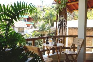 Casa Redonda Penthouse, In the Heart of Sayulita with ocean view and rooftop palapa with hammock