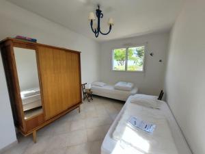 Villas Magnifique maison face a la mer : photos des chambres
