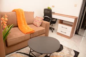 Cozy partitioned studio in Smarthomes Serviced Apartment-Kilimani