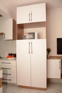 Cozy partitioned studio in Smarthomes Serviced Apartment-Kilimani