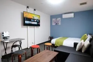 Cocostay エレガンス京町 - 移動に超便利な中心部に泊まろう-最寄り駅から徒歩5分-広々Qサイズベッドに駐車場あり - Aminohama